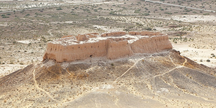 Ayaz Kala fortress from above with sandstone architecture, surrounded by desert
