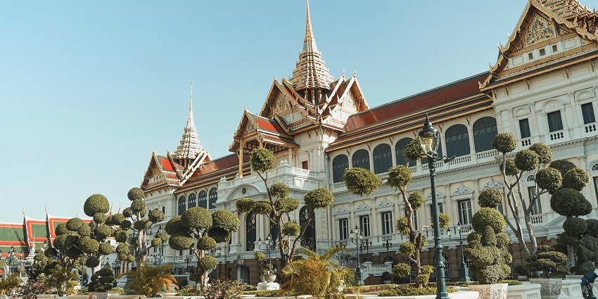 Grand Palace in Bangkok with golden spires and intricate Thai architectural details