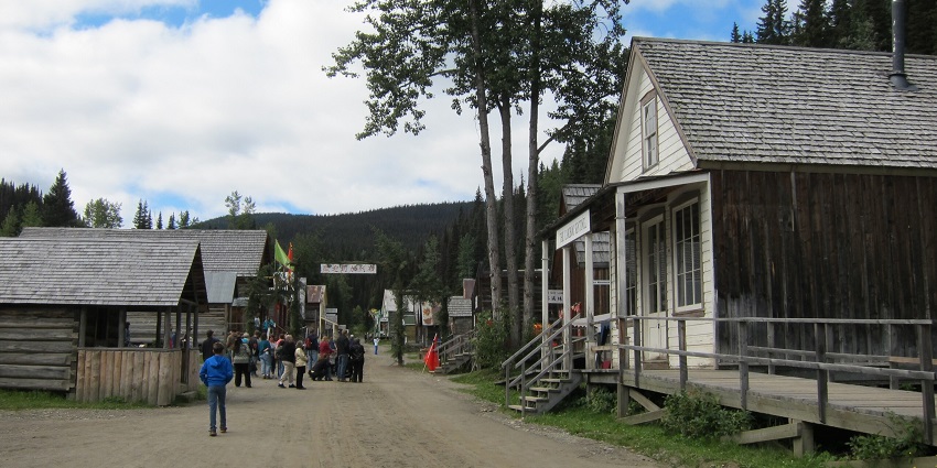 Barkerville historic town in British Columbia with traditional-style houses and people on the streets