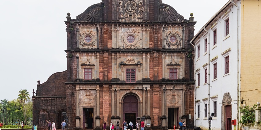 Front facade of the Basilica of Bom Jesus in Old Goa with old architectural building