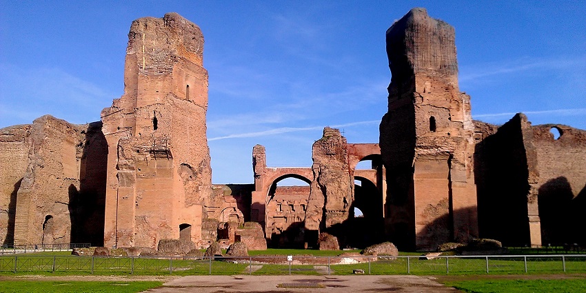The spectacular view of the Baths of Caracalla in Rome, beneath a blue sky on a perfect sunny day.