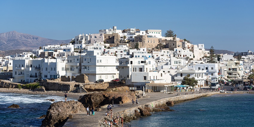Charming Cycladic island with stunning beaches, rich history, traditional villages