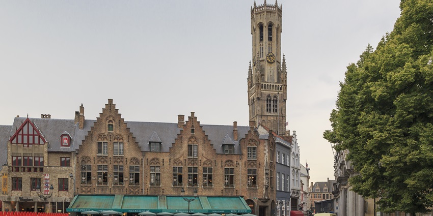 The Belfry of Bruges is a towering medieval bell tower among the monuments in Belgium.