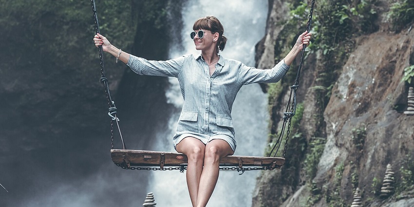 Swinging with a view of Blangsinga Waterfall makes this one of the most scenic and unique experiences near Ubud.