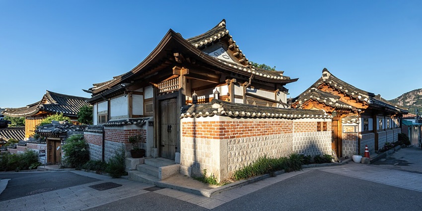 Streets of Bukchon Hanok Village with traditional Hanok houses and sidewalks, Seoul