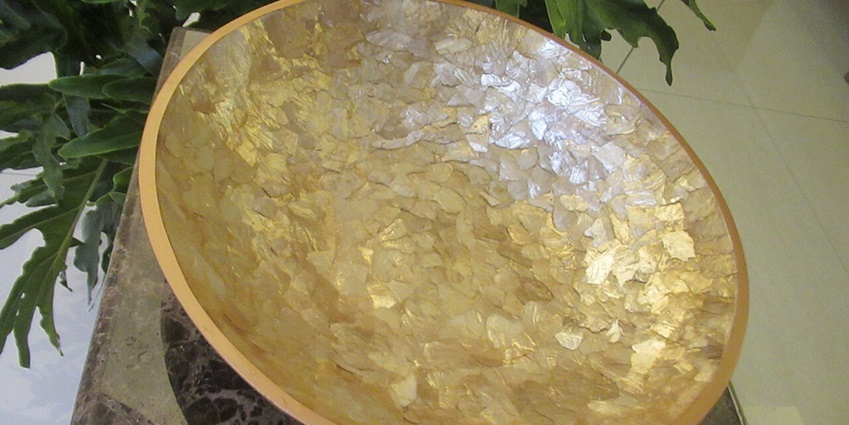 Things to buy in the Philippines include the elegant sheen of capiz shell products like lamps, trays, and wall décor.
