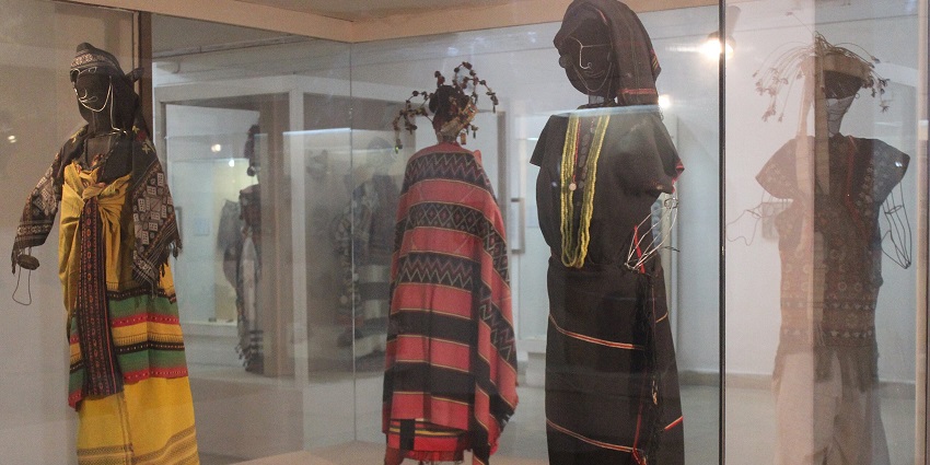 Inside a museum with old structures and things on display in the heritage gallery, one of the best places to visit in Shillong in October.