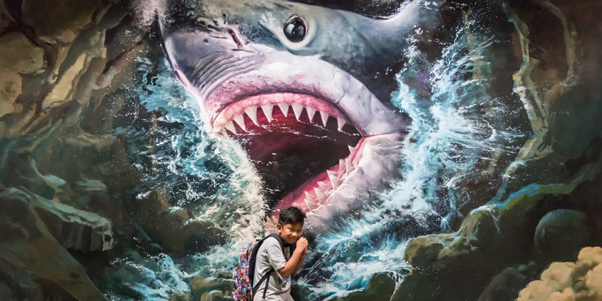 Things to do in Pattaya with family include interacting with 3D optical illusions and taking creative photos at Art in Paradise.
