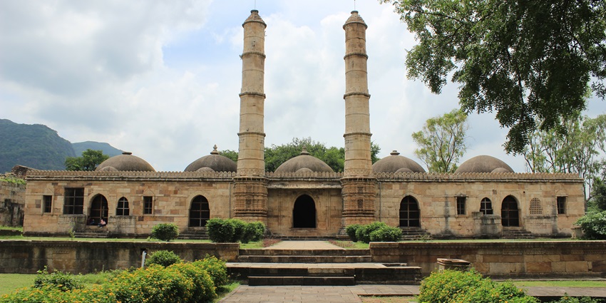 Historic park with centuries-old Islamic and Hindu architecture at the Pavagadh Hill base.