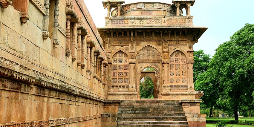 UNESCO site with ancient Islamic and Hindu ruins on forested Pavagadh Hill and historical mosques, among the places to visit in Gujarat in November.