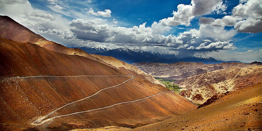 Chang La Pass winds through rugged terrain at the world’s third-highest motorable altitude