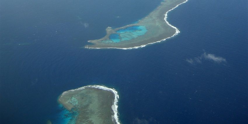 Explore sunken WWII shipwrecks and vibrant coral reefs, among the islands in Micronesia.