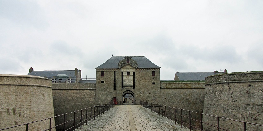 The stone entryway of Citadelle de Port-Louis showcases colonial-era architecture in Mauritius.