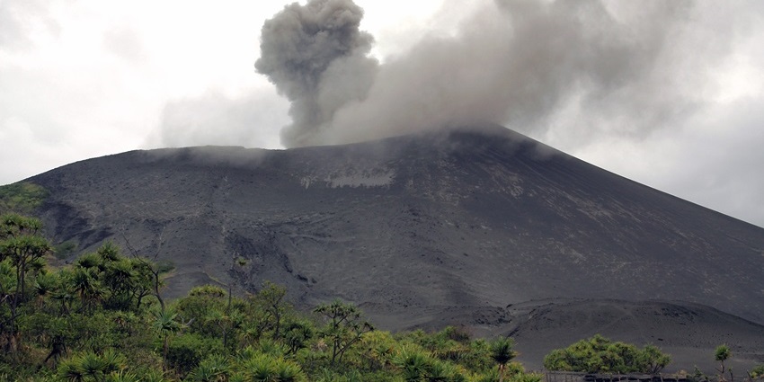 Adventure seekers climb Tanna Island’s active volcano amid lush greenery and smoke