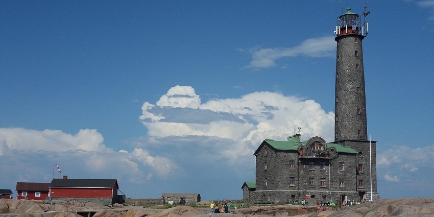 Remote lighthouse island offering stormy seas and rugged beauty.