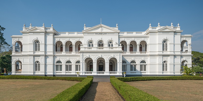 Colonial-style National Museum building in Colombo with white pillars and ornate facade