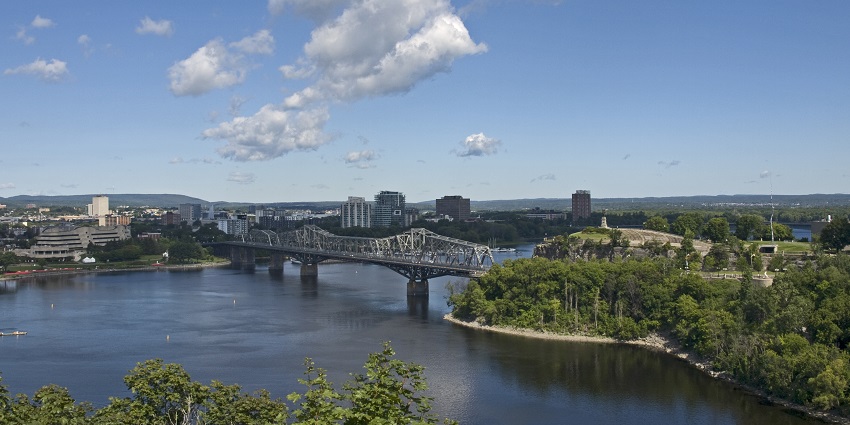 Pedestrian bridge with stunning views connecting Ottawa and Gatineau across the river.