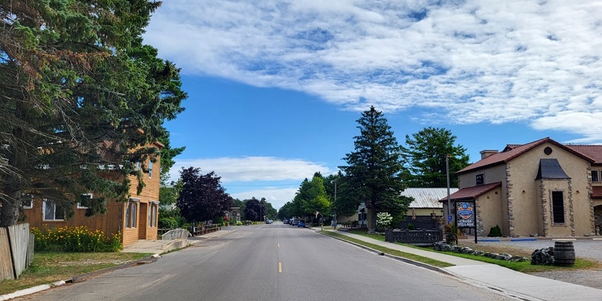 Street in a cross village with traditional houses on both sides, is one of the historical places in Michigan.