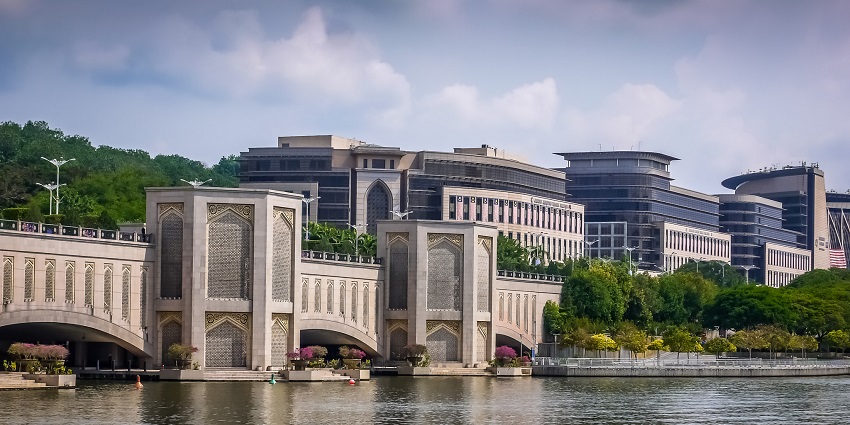 A relaxing lake cruise is one of the best things to do in Putrajaya for scenic views and a breeze.