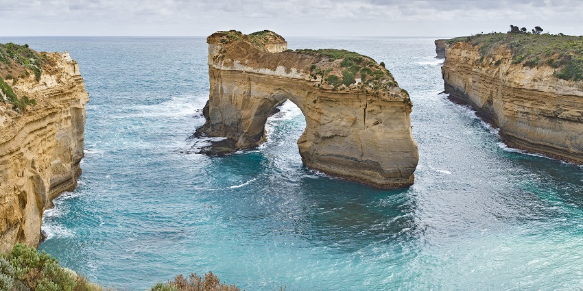 Coastal cliffs and winding roads with ocean views highlight the top things to do in Victoria.