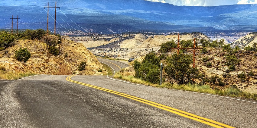 Drivers wind through alpine forests on one of America’s most beautiful scenic highways.