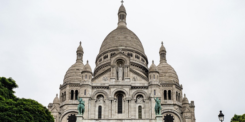 Historic church with intricate architecture and quiet surroundings, capturing the cultural charm of Paris