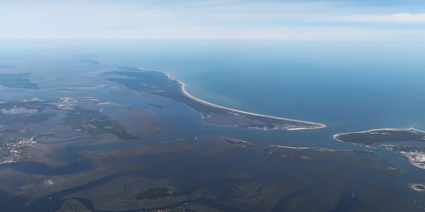 Aerial view of beaches and forest paths near historic mansions on remote Cumberland Island