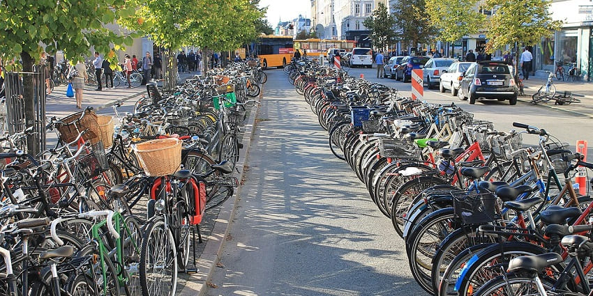 Things to do in Denmark in summer include exploring bike-friendly streets, colourful houses, and waterfront paths.