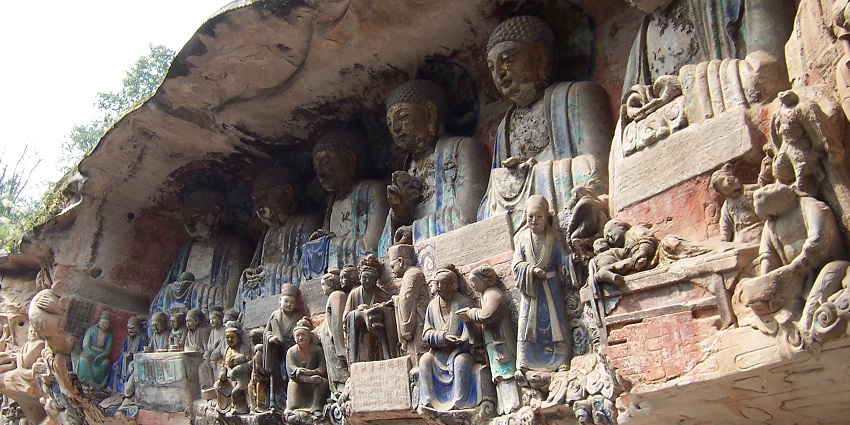 Dazu rock carvings with detailed, intricate Buddhism carvings and slightly coloured