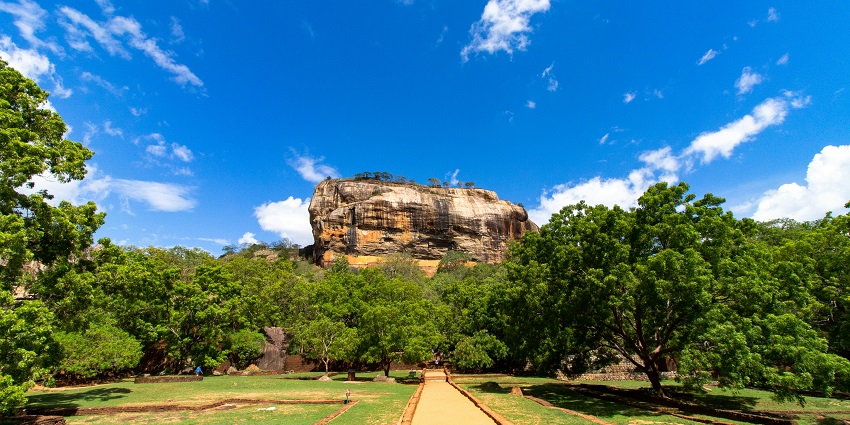 Lush forest path offering a glimpse into why April is good to visit Sri Lanka region.