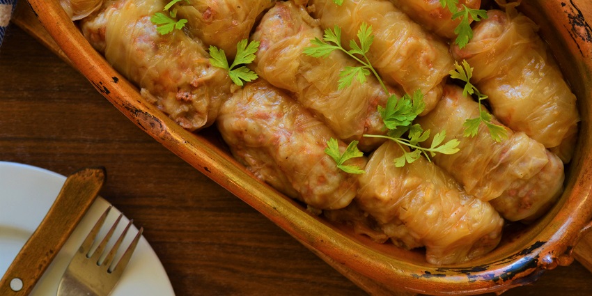 Sarmale, a slowly cooked dish from cabbage leaves rolled with a filling of minced meat and rice you can enjoy in Cluj-Napoca