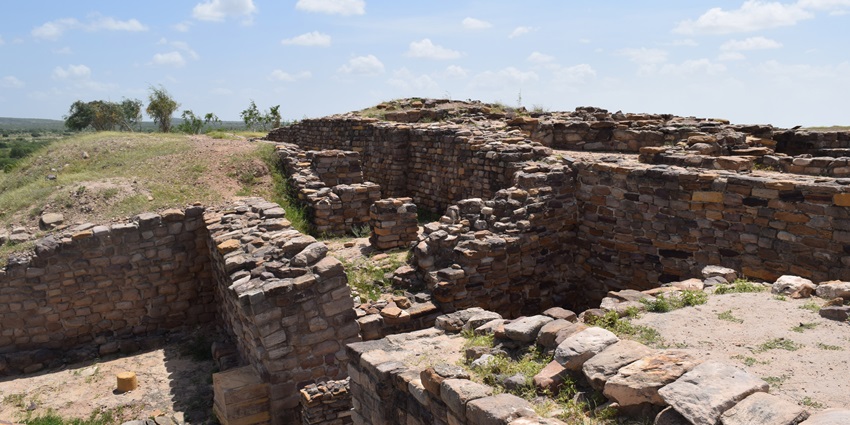 Ancient Harappan city with preserved ruins and water systems in the Rann of Kutch, among the best places to visit in Gujarat in July.