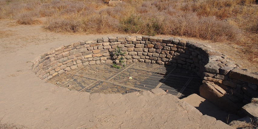 Ruins of an ancient Harappan city with reservoirs and city layout at Dholavira in Kutch.