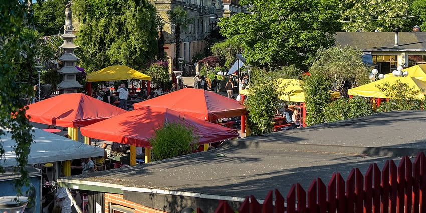 Exploring a community known for vibrant murals, creative spirit, and alternative lifestyle, is one of the things to do in Denmark in summer.