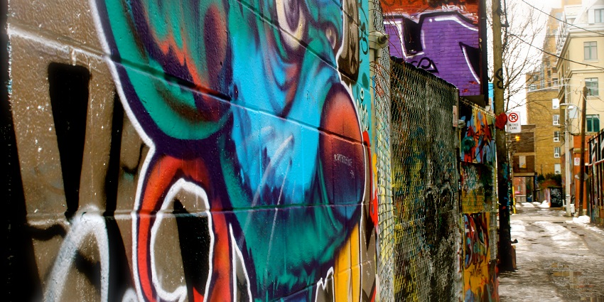 Explore Graffiti Alley in Ghent, an open-air gallery showcasing street art and urban creativity.
