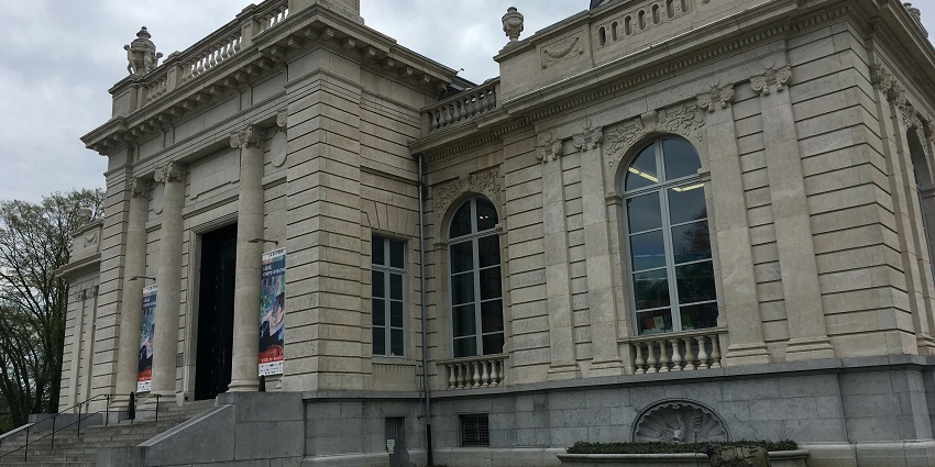 Museum exterior honouring saxophone inventor Adolphe Sax in Dinant.