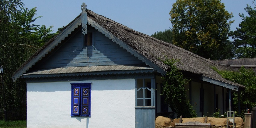 Traditional wooden homes and windmills at this open-air museum in Bucharest.