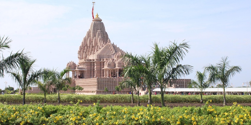 Spiritual town with seaside temples dedicated to Krishna and peaceful coastal views.
