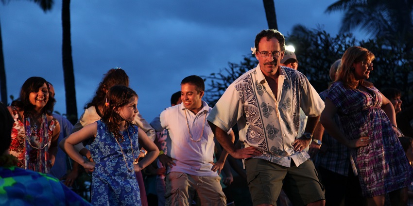 Feast on roasted pig and poi while watching hula and fire dancers in a festive Hawaiian-style.
