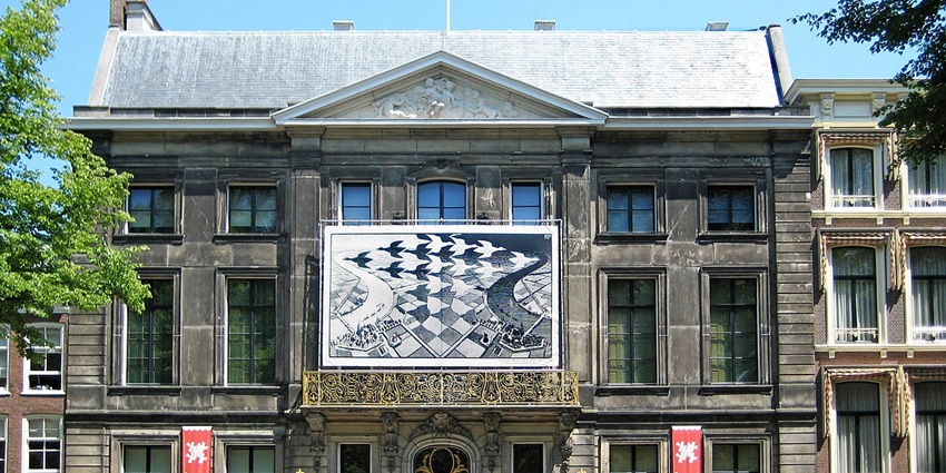 Exploring mind-bending works of optical illusion and art at the Escher museum, housed in a former royal palace, is one of the top things to do in The Hague.