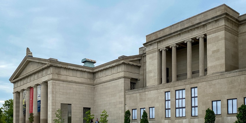 Exploring diverse collections of paintings and sculptures inside the Cincinnati Art Museum, one of the best things to do in Cincinnati.