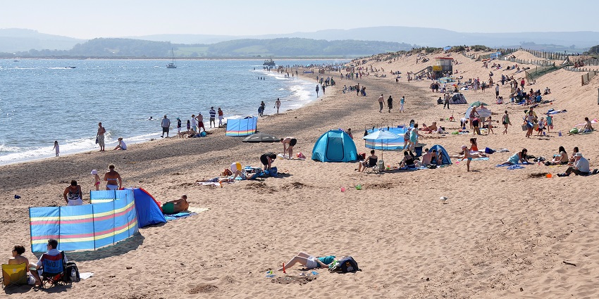 Exmouth Beach, East Devon, includes diving into windsurfing, paddleboarding, or swimming