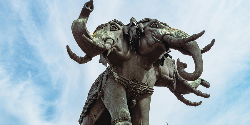 A detailed three-faced elephant statue on top of the Erawan Museum in Samut Prakan, one of the iconic places to visit in Thailand in March.