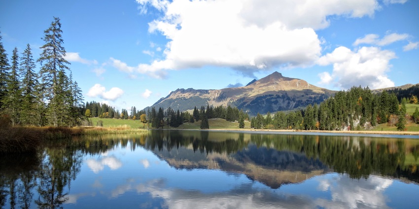 A serene escape with crystal-clear waters, among the best things to do in Gstaad, Switzerland.