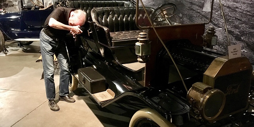 An image of a vintage model, showcased in a large hall celebrating America’s automotive past.