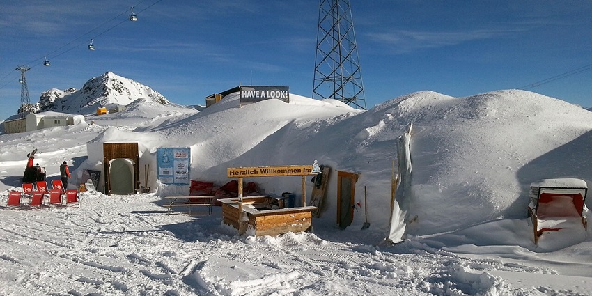 Explore the Gstaad Igloo Village, a winter wonderland of snow and ice architecture.
