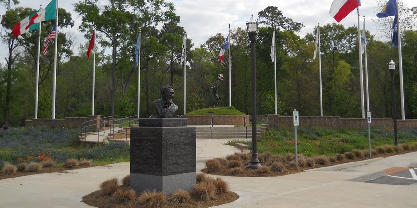 Image of historic Texas flags and monuments commemorating the Lone Star State’s history.