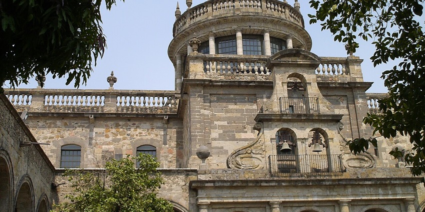 Historic structure with central dome and trees—essential for things to do in Guadalajara.