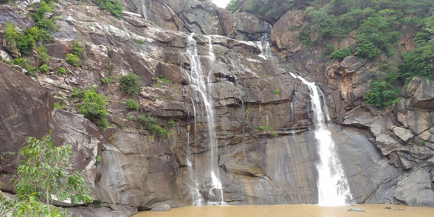 Places to visit near Jamshedpur within 200km include a waterfall that tumbles over rocky cliffs.

