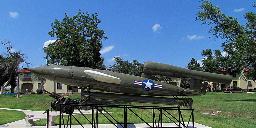 JB-2 Loon outside a stone building at Fort Sill, one of the historical places in Oklahoma